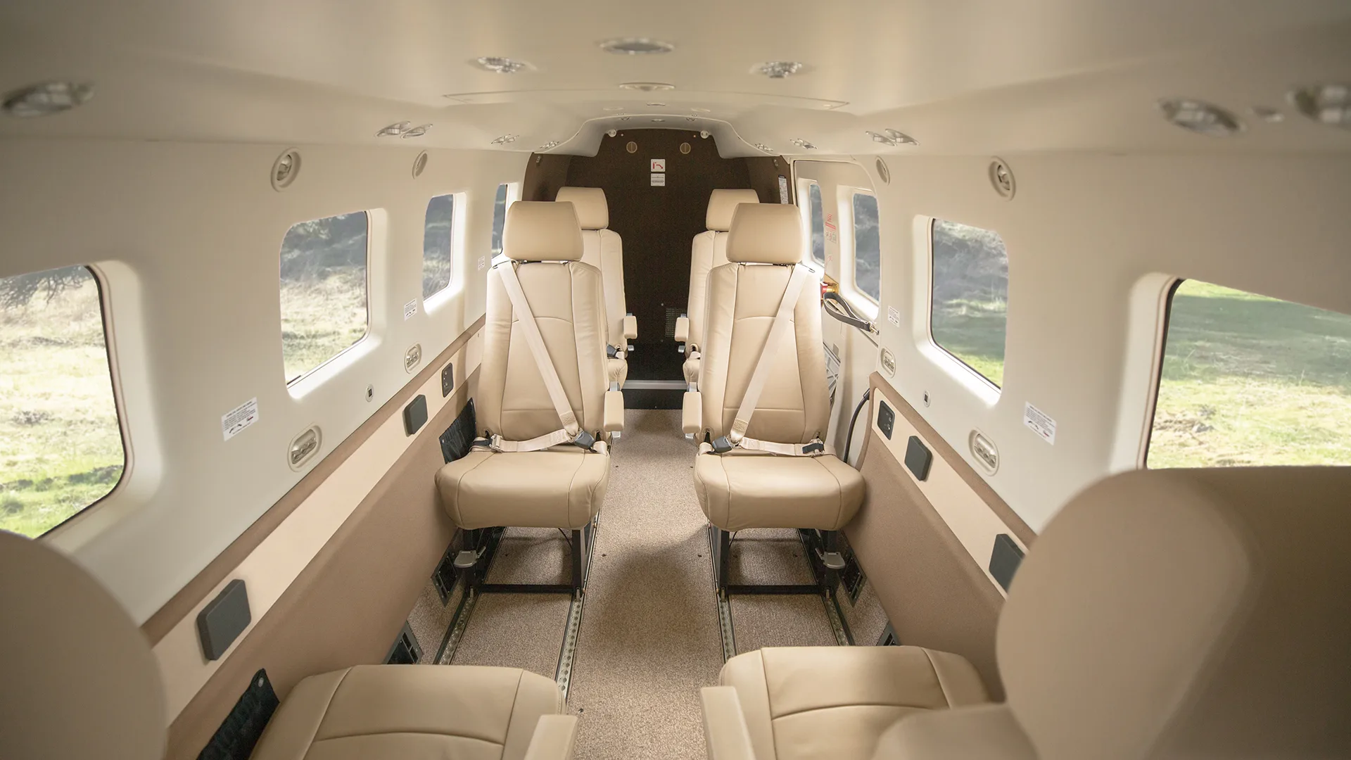 Daher Kodiak 100 cabin interior with club-configuration leather seating